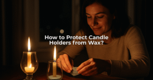 A woman places a protective barrier inside glass candle holders at night to prevent wax buildup, creating a warm, cozy atmosphere with burning candles.